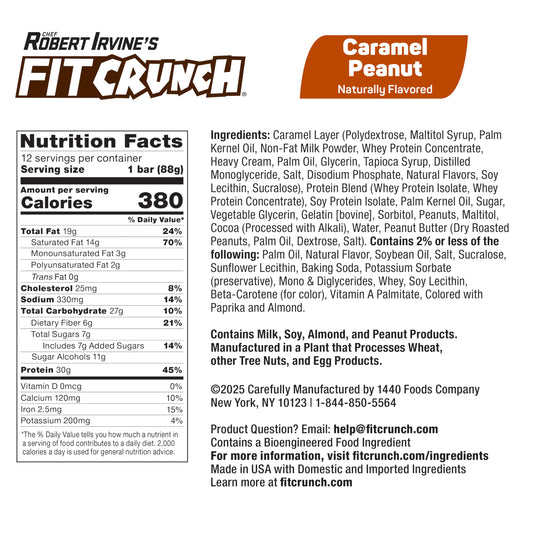 Fit Crunch caramel peanut bar unwrapped on a desk, a ready-to-go workout snack.