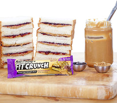 Fit Crunch packaged bar display emphasizes convenient protein on the go.