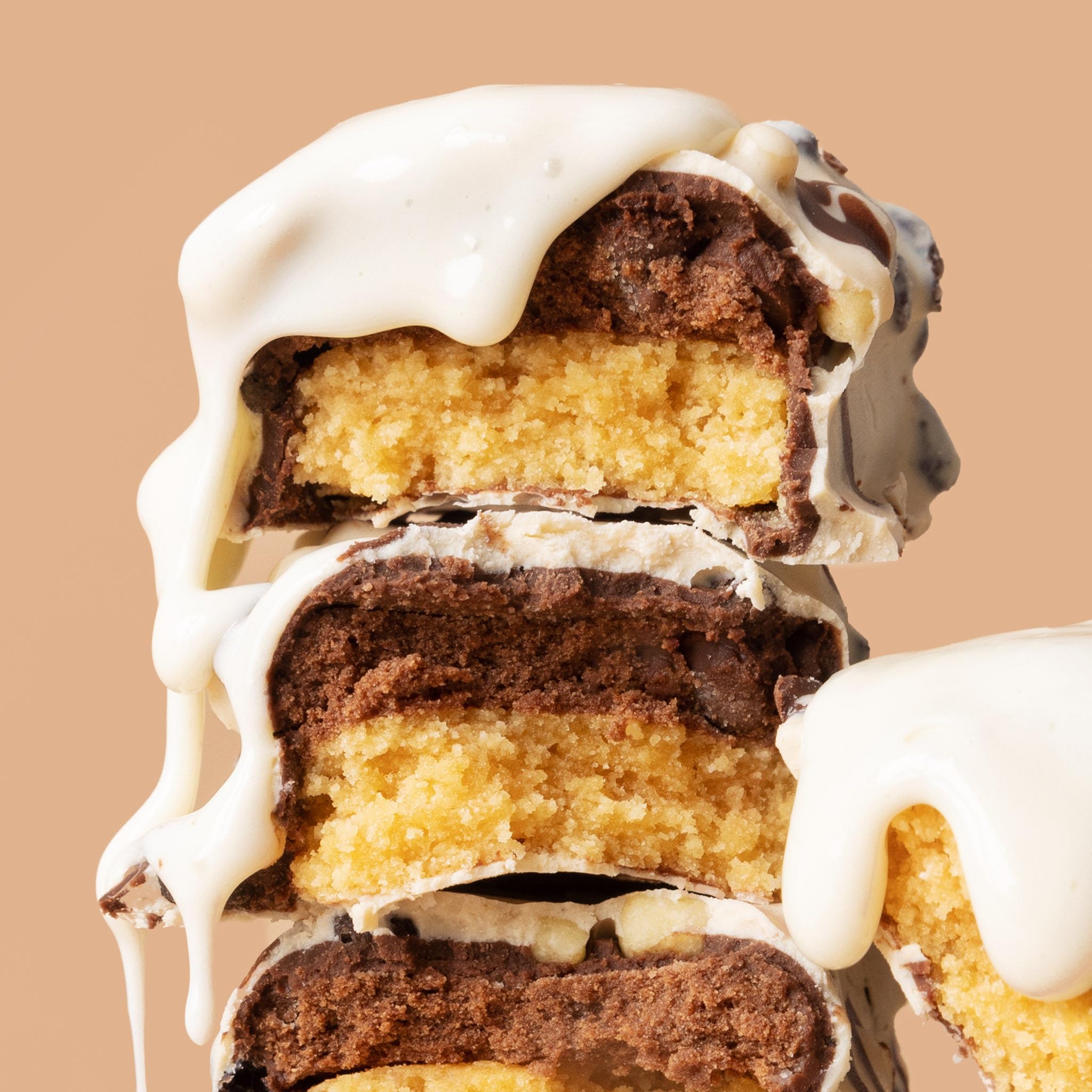 FITCRUNCH Milk & Cookies texture close-up, soft cake core offers a comforting chew.