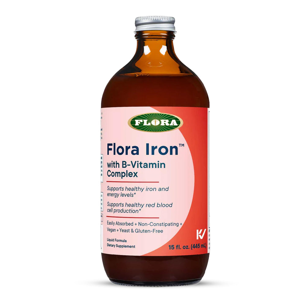 Flora Iron with B-Vitamin Complex bottle on kitchen counter for daily energy support.