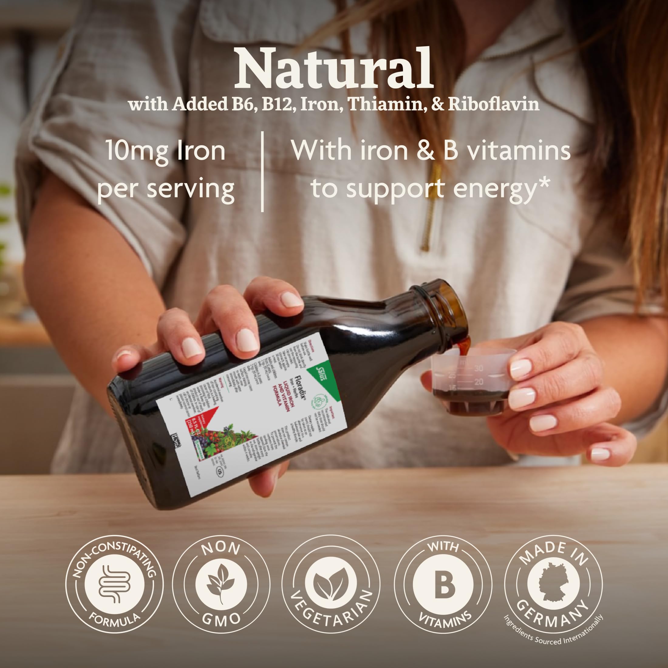 Open Floradix bottle with glass ready for a vitamin-rich daily routine.