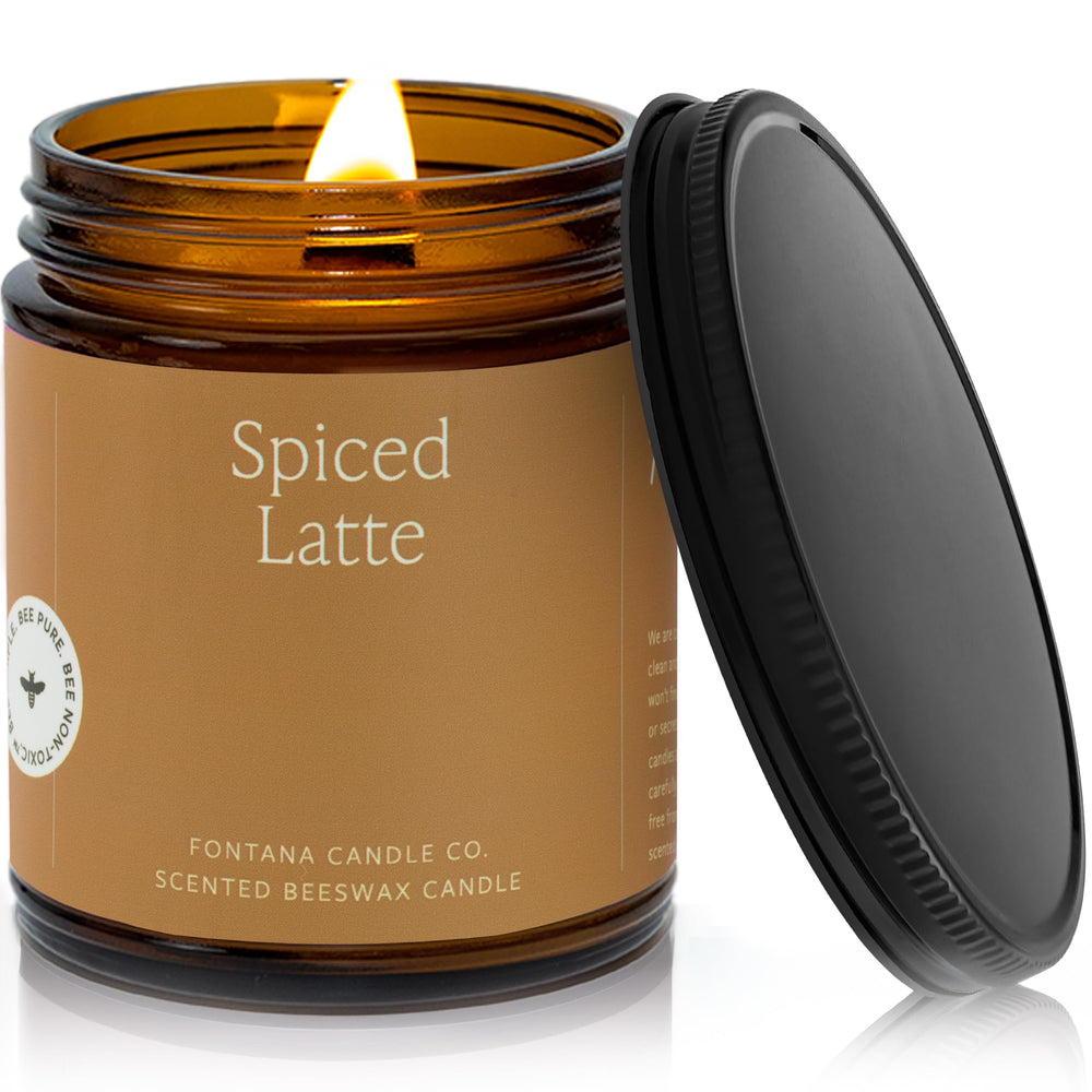 Fontana Candle Co spiced latte wood wick jar glowing with warm ambience
