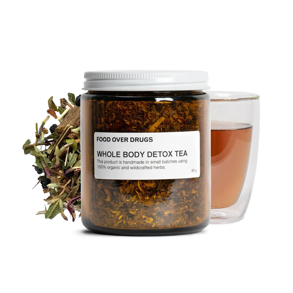 Food Over Drugs Whole Body Detox Tea packaging highlights organic herbs for daily balance.