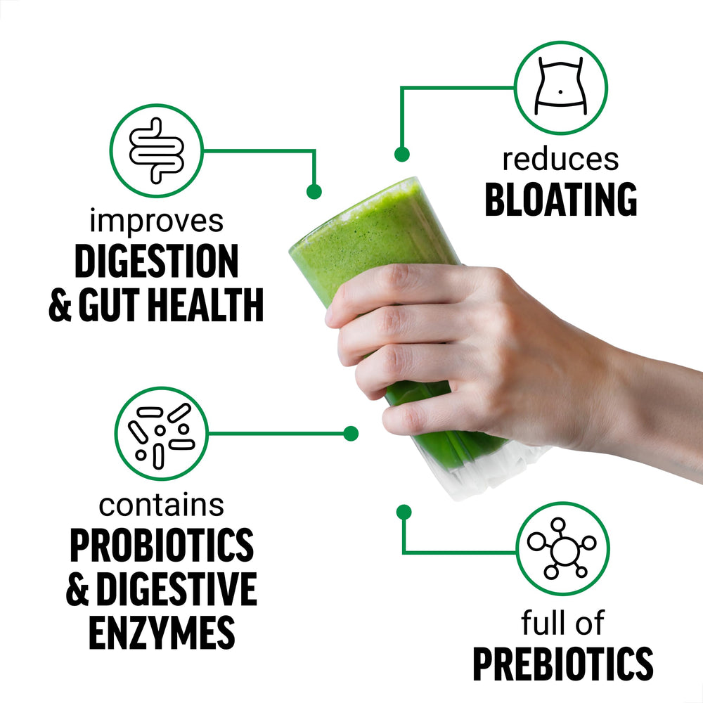 Glass of water with Smarter Greens powder dissolving for refreshing hydration.