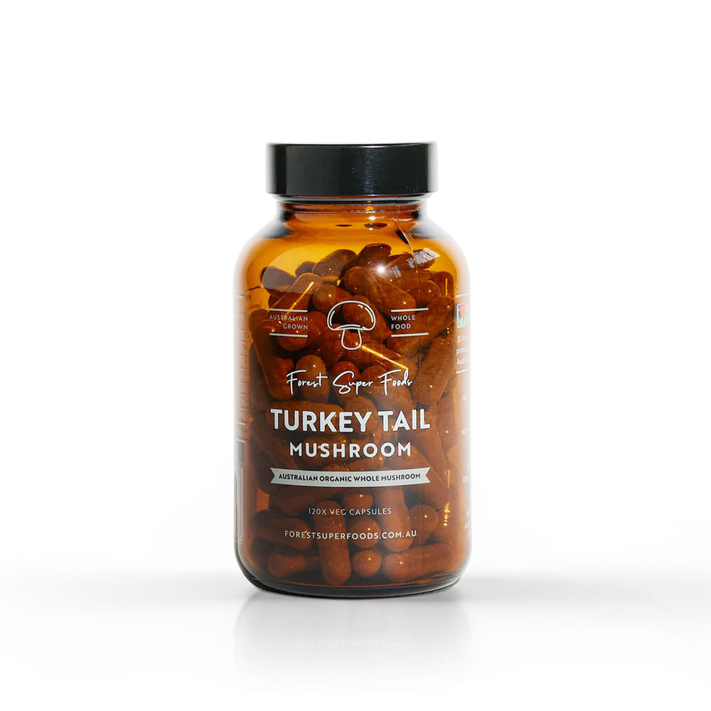 Forest Super Foods Turkey Tail bottle on kitchen counter for gut support.