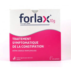 Forlax powder being poured into a glass of water to aid bowel movements.