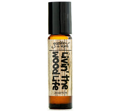 Frankie & Myrrh Livin' the Wood Life roll-on bottle for everyday earthy vanilla cedar patchouli scent