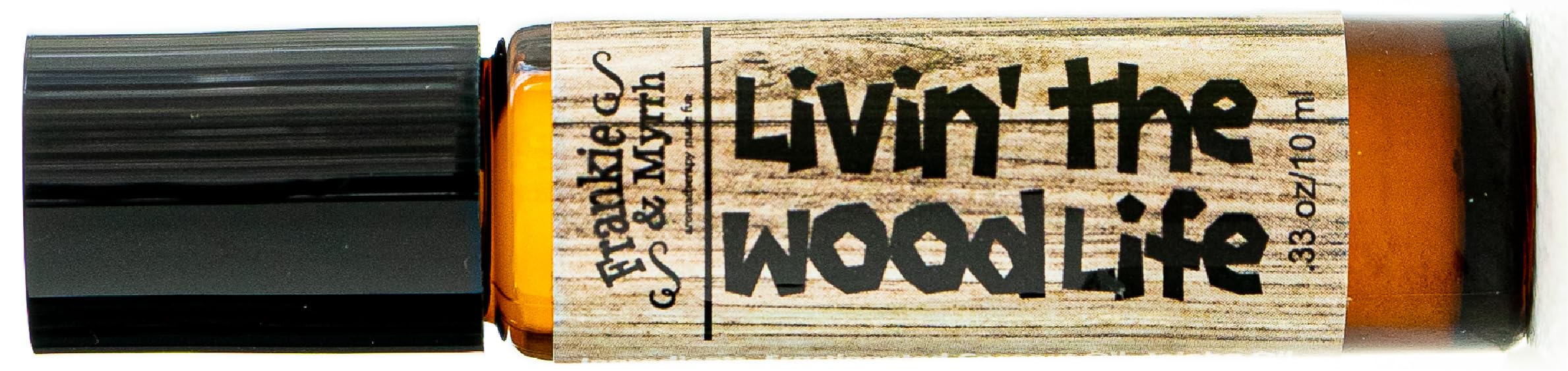 Frankie & Myrrh Livin' the Wood Life roll-on highlights patchouli for grounding moments
