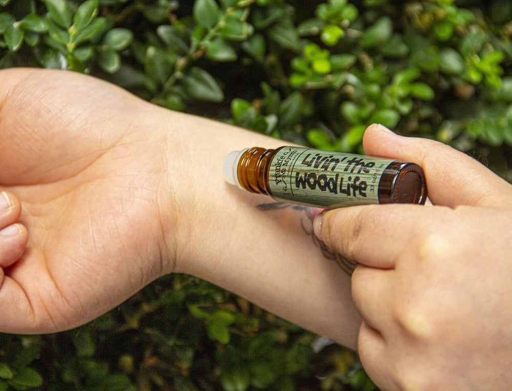 Frankie & Myrrh Livin' the Wood Life roll-on scent featuring patchouli warmth with cedar and vanilla