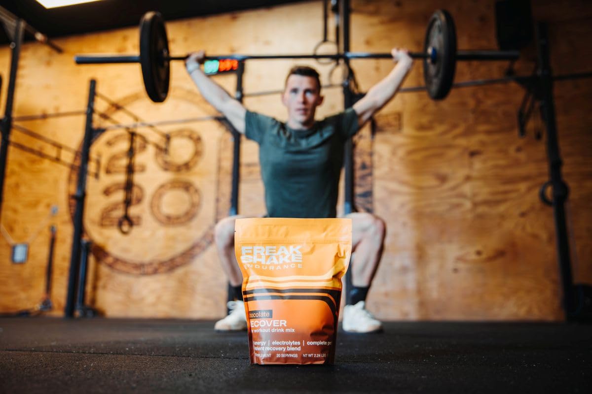 Freak Shake Recover chocolate glass ready suggests a refreshing endurance drink after training.