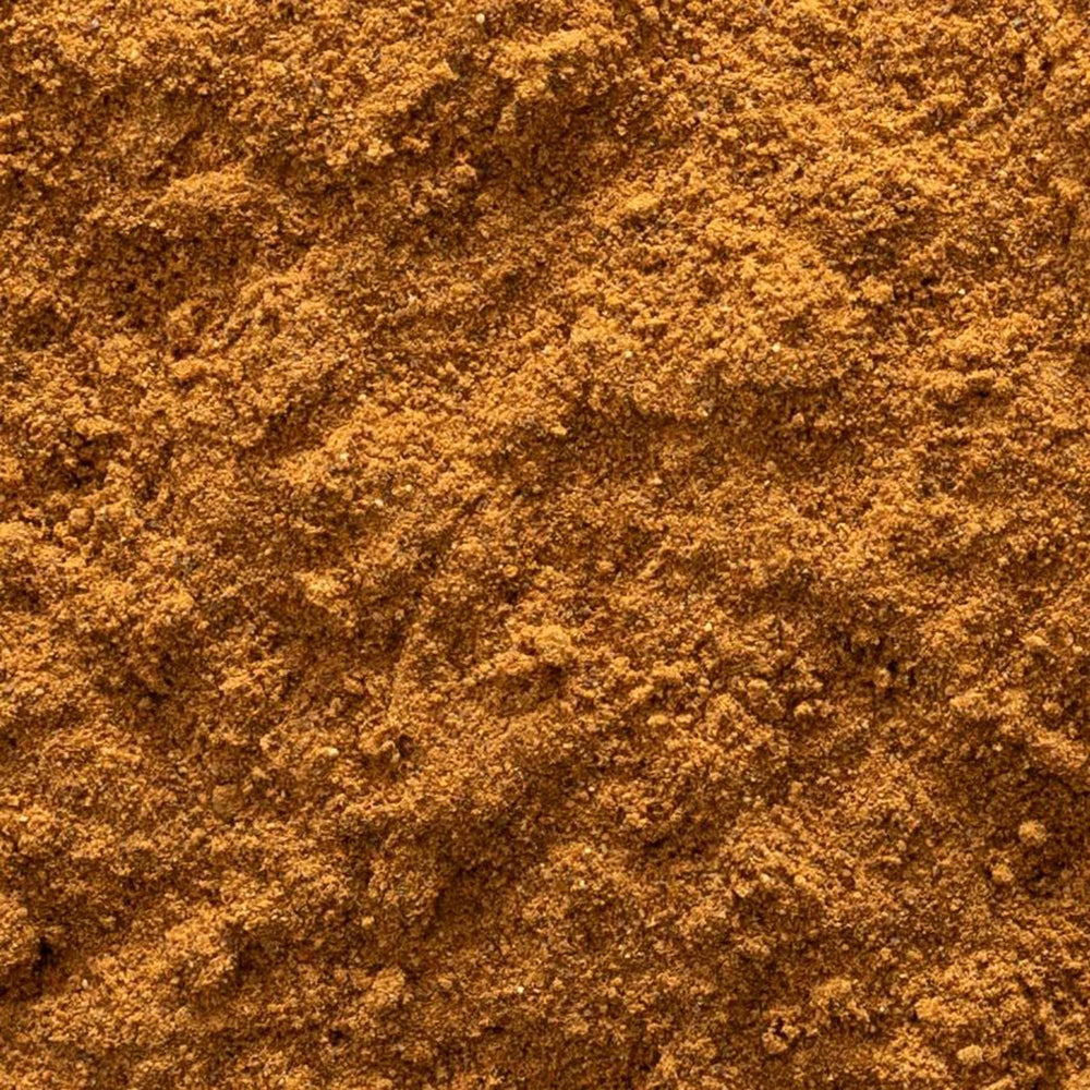 Frontier Co-op Guarana Powder scoop in use for energizing beverages.