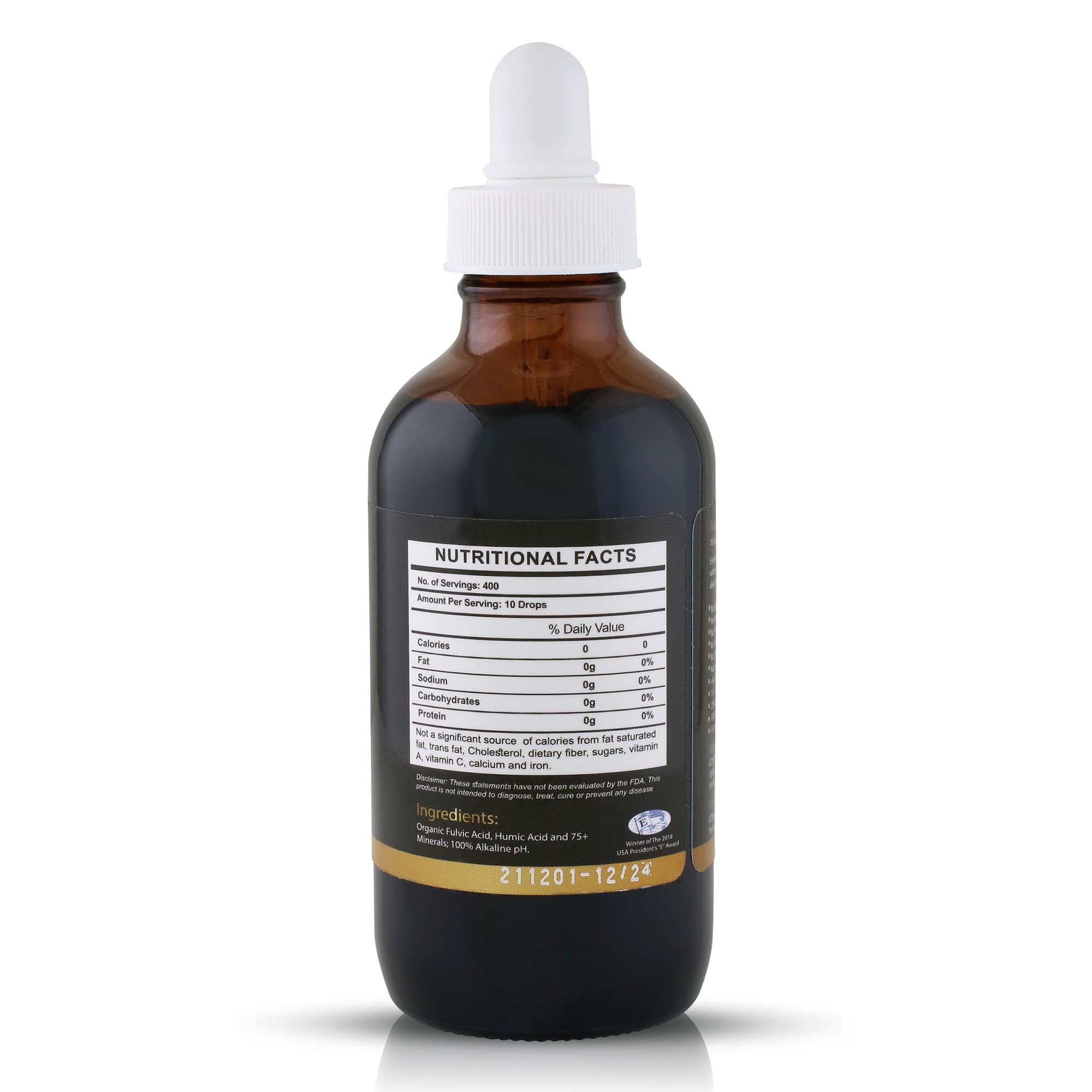 Glass of water with Fulvika Trace Mineral Drops suggesting alkaline hydration