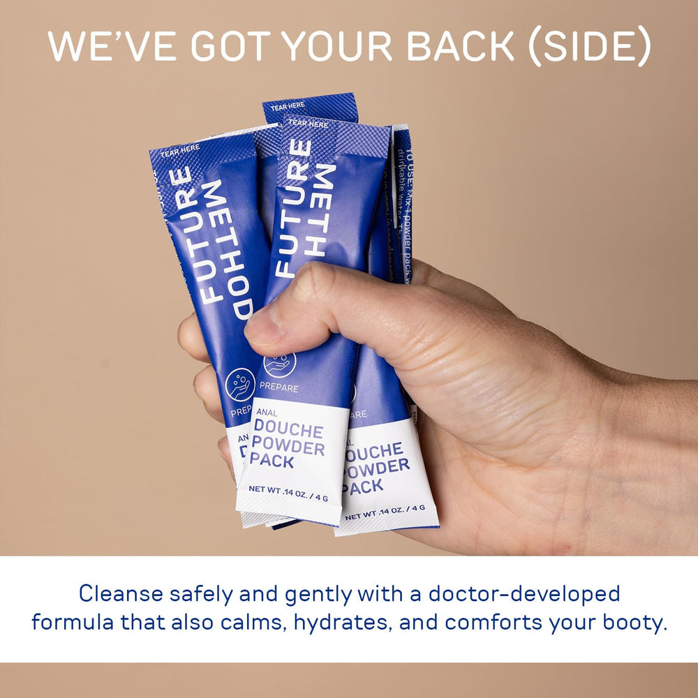 Powder dissolving in water to form a gentle cleansing solution.