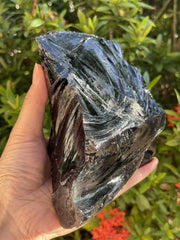 GAF TREASURES natural black obsidian slab showcases glossy finish and natural formation.