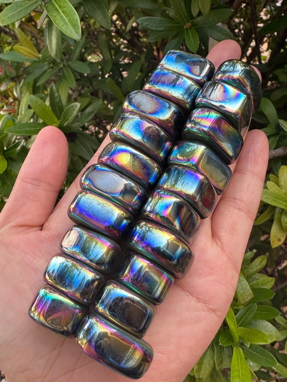 GAF Treasures rainbow-coated hematite stones invite tactile focus during meditation sessions