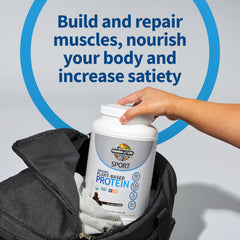Garden of Life vegan chocolate scoop demonstrates easy portioning for quick shakes.