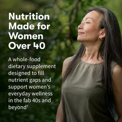 Garden of Life Women's Multivitamin bottle label shows vegan, gluten-free credentials and non-GMO quality.