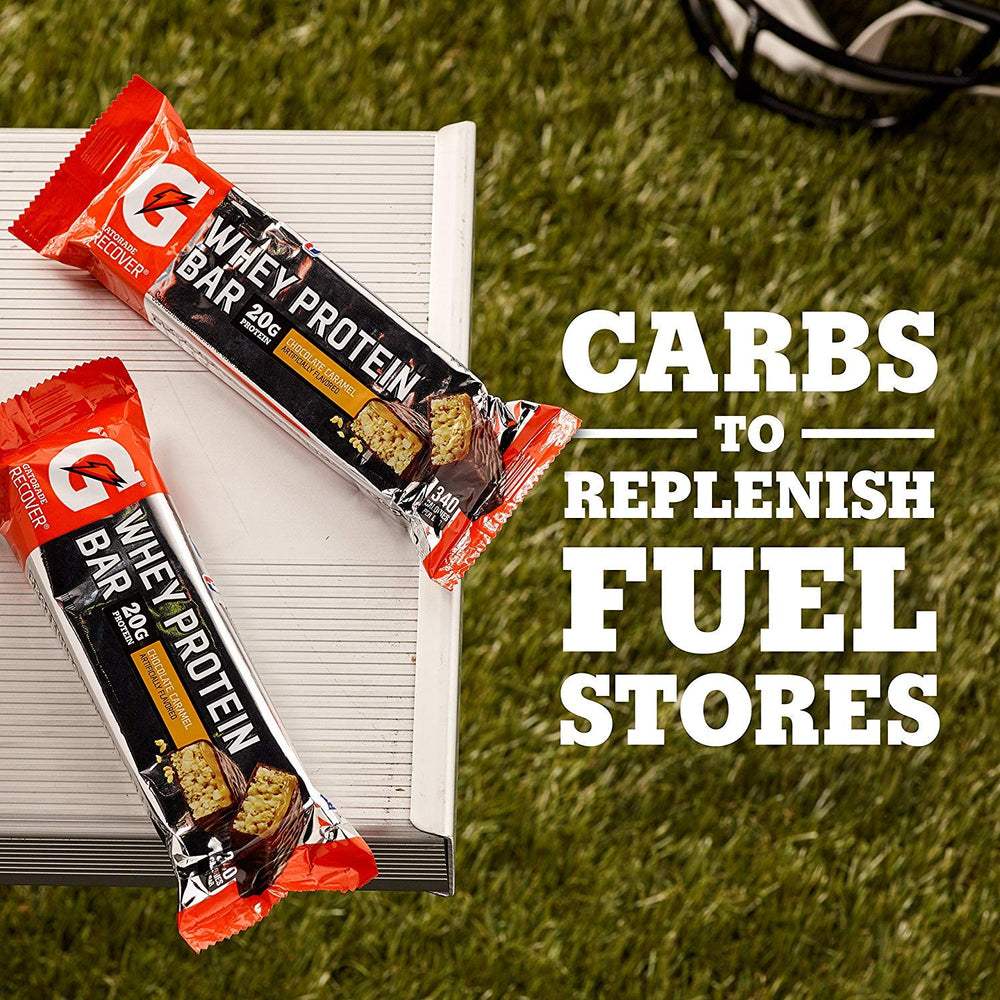 Gatorade Recover Bars beside gym bag, perfect for quick fueling