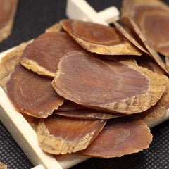 Generic 6-year premium-grade ginseng slices closeup highlighting rich texture.