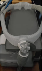 Generic shelf shows dual hooks for versatile organization of headgear and hoses
