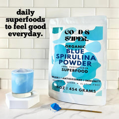 Generic blue spirulina powder in a smoothie glass for vibrant color.