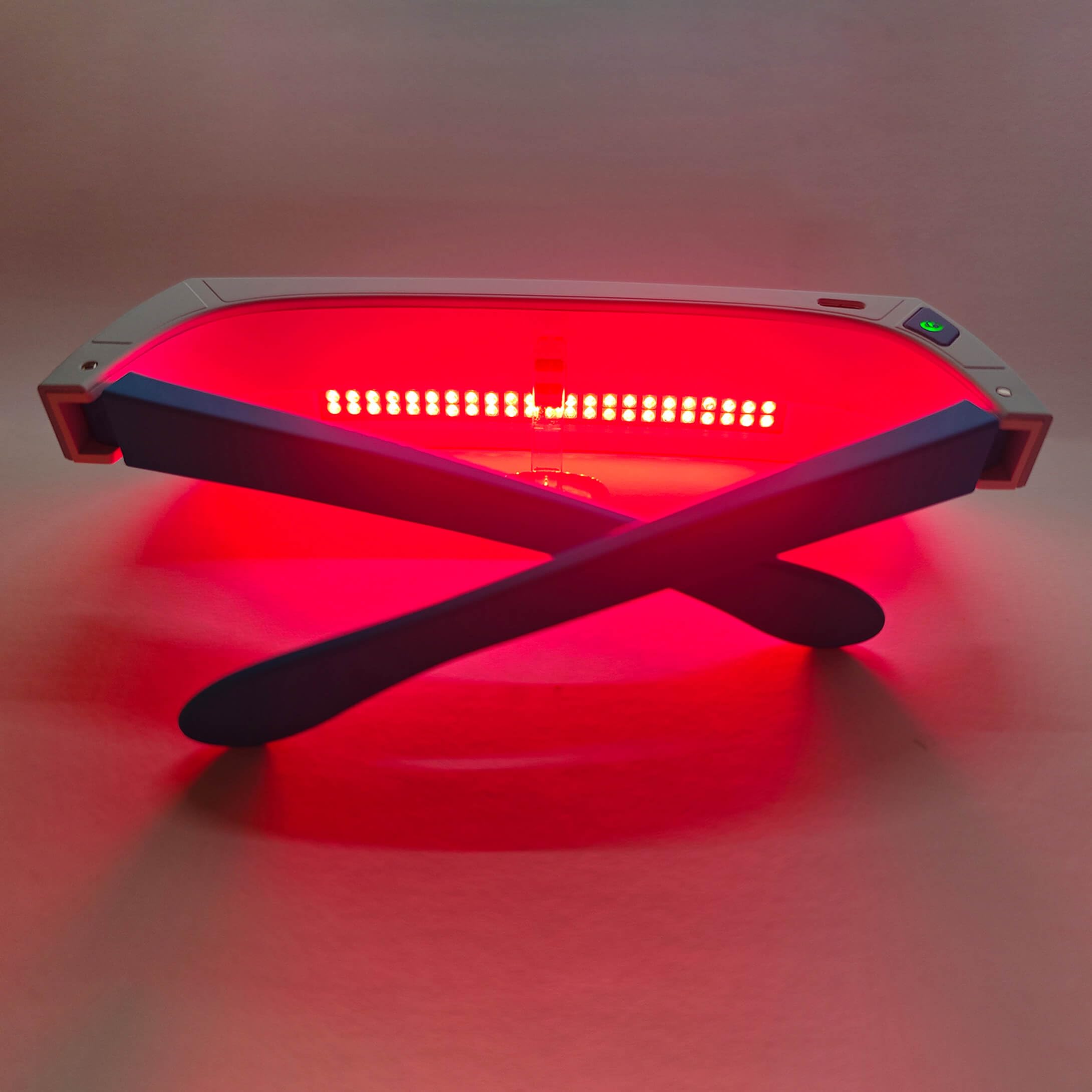 Generic red light therapy glasses over prescription glasses for comfortable wear.