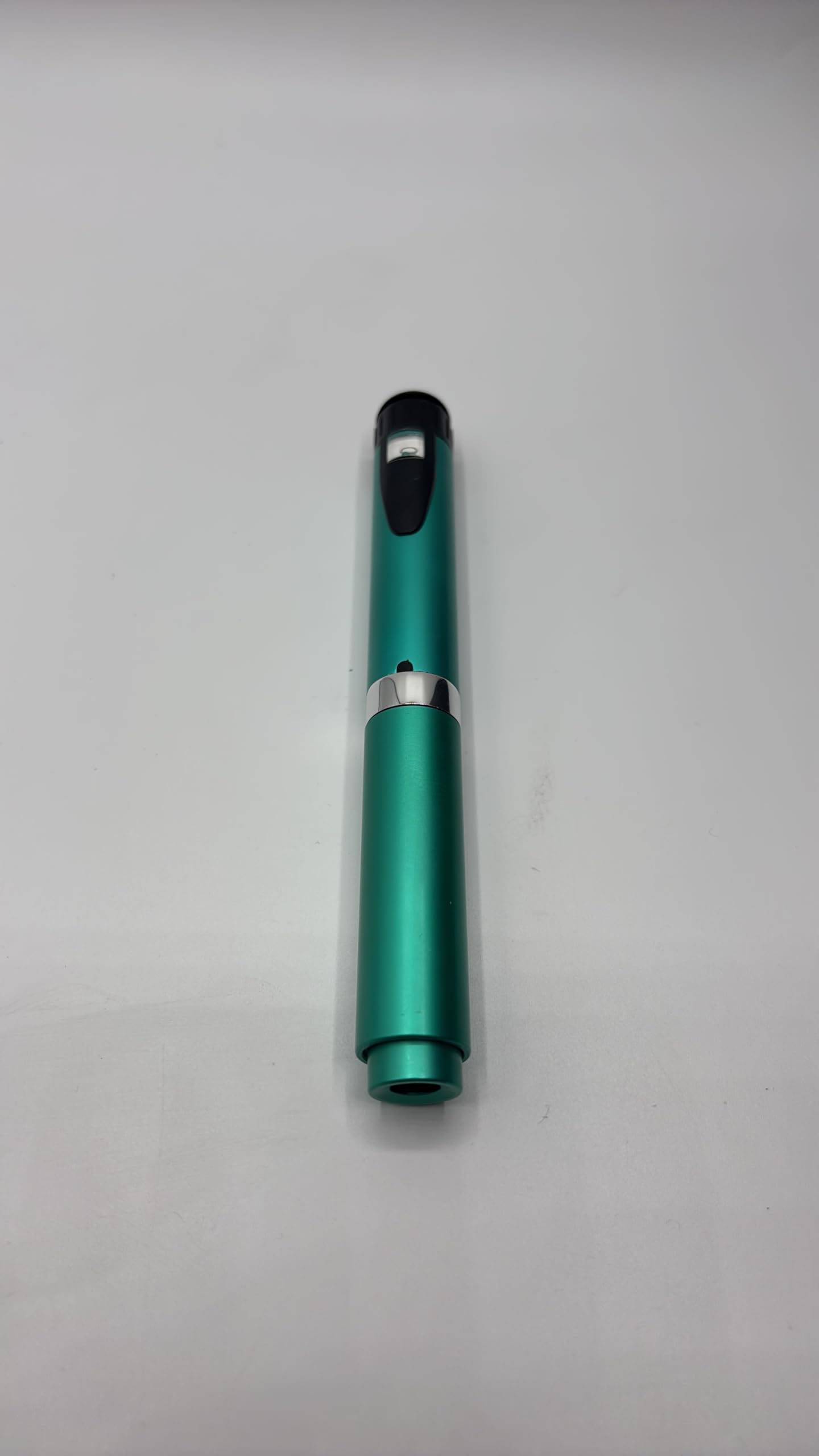 Generic reusable injection pen teal with cartridge for precise, convenient dosing.