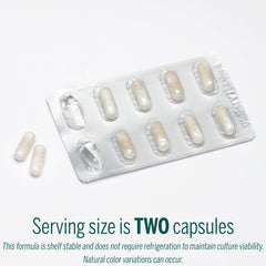 HMF Travel capsule close-up with bottle label and dosage details.