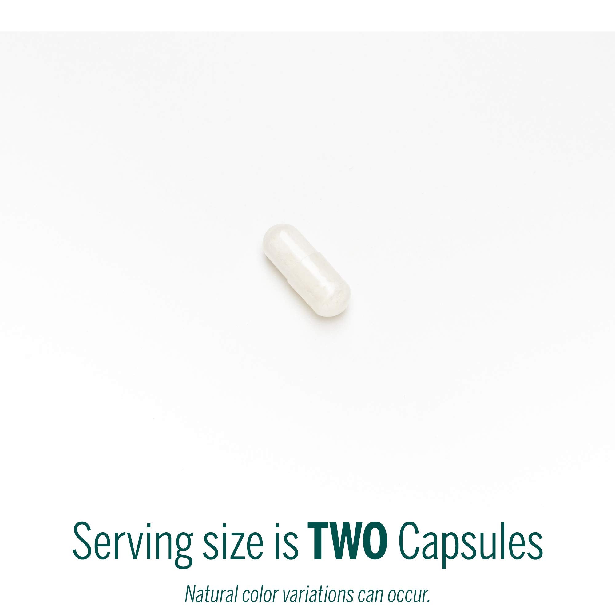 Genestra V-Enzymes capsules closeup of plant-based digestive capsules.