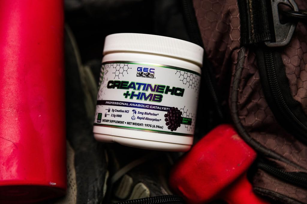Plastic scoop beside the powder for a quick pre-workout mix.