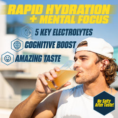G Fuel Electrolytes Peach bottle with glass showing clear hydration.