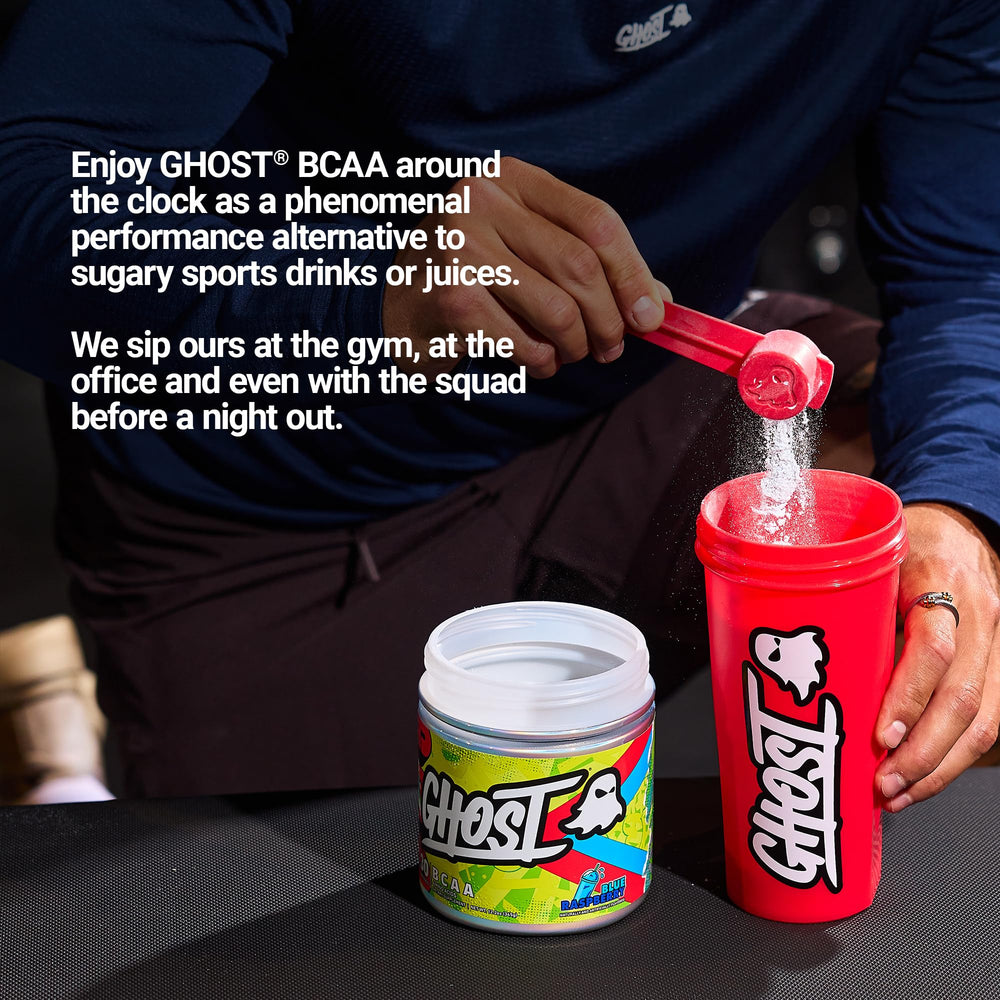 Ghost BCAA Blue Raspberry mix in a shaker glass, emphasizing flavor and mixability