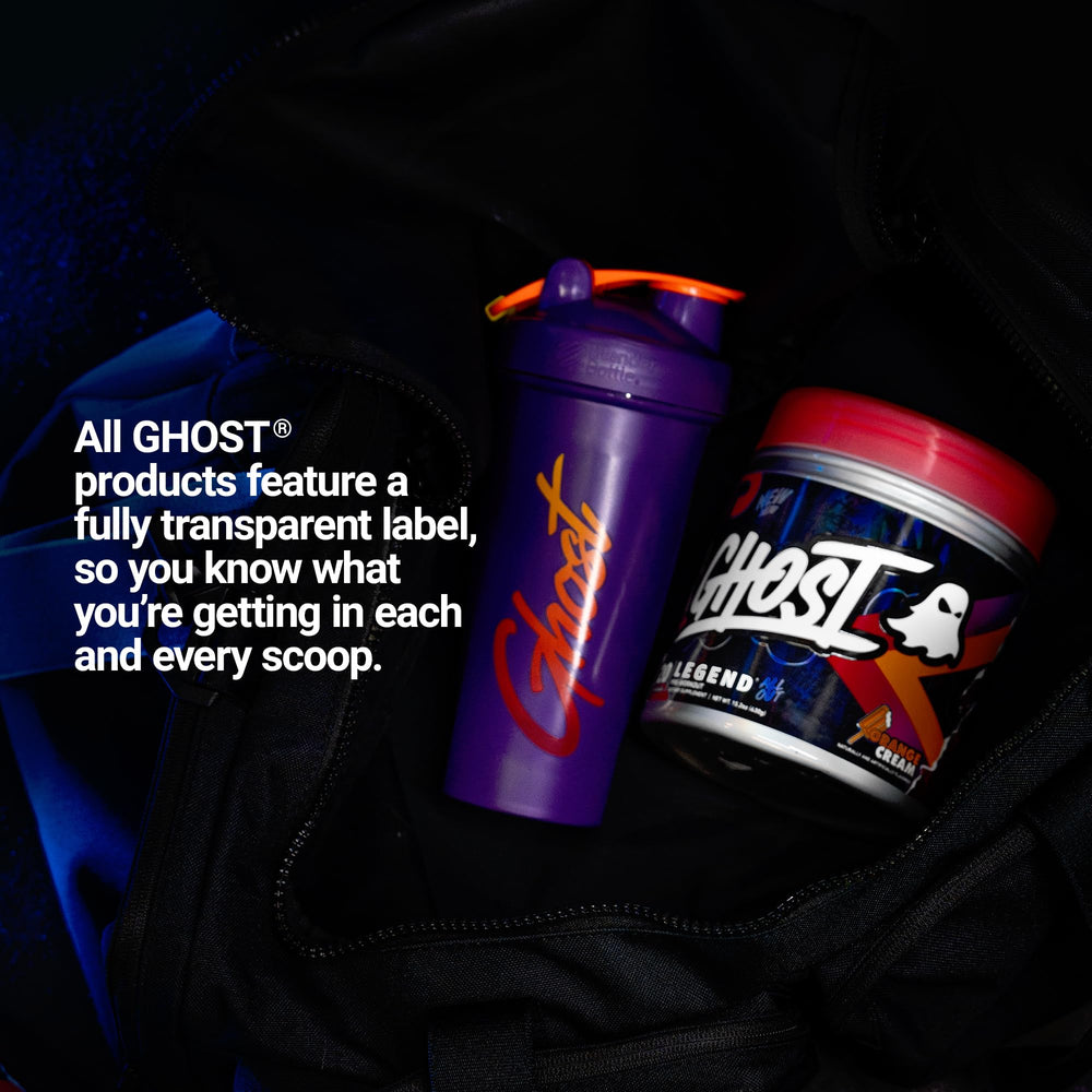 Measuring scoop in hand ready to fuel a workout session with GHOST All Out.