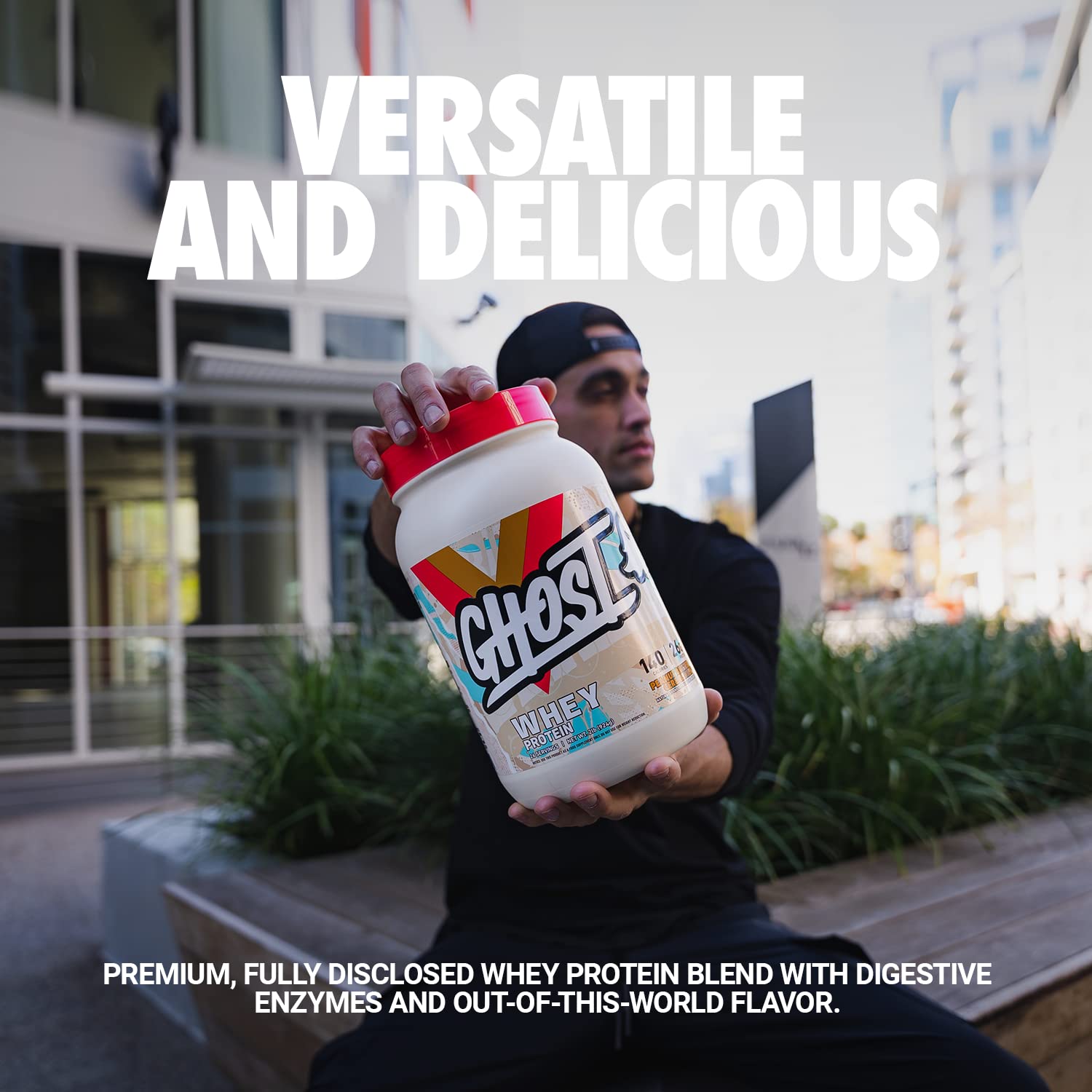 Scoop pouring into glass, showcasing 26g protein per serving.