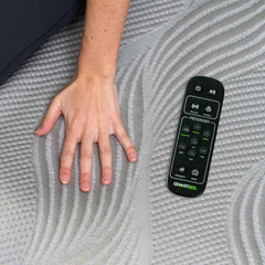 GhostBed massage mat with wireless remote for easy control.