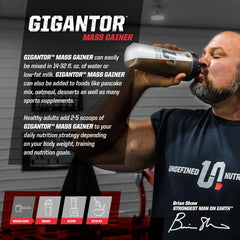 Gigantor Mass Gainer vanilla cup with scoop ready to mix