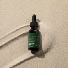 Close-up of B12 ingredients in glass bottle featuring the methylcobalamin blend.