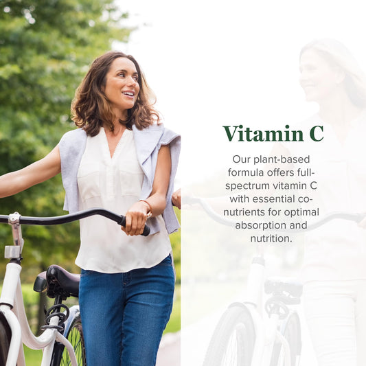 Global Healing Center Vitamin C Drops pour demonstrates easy application for immune support.