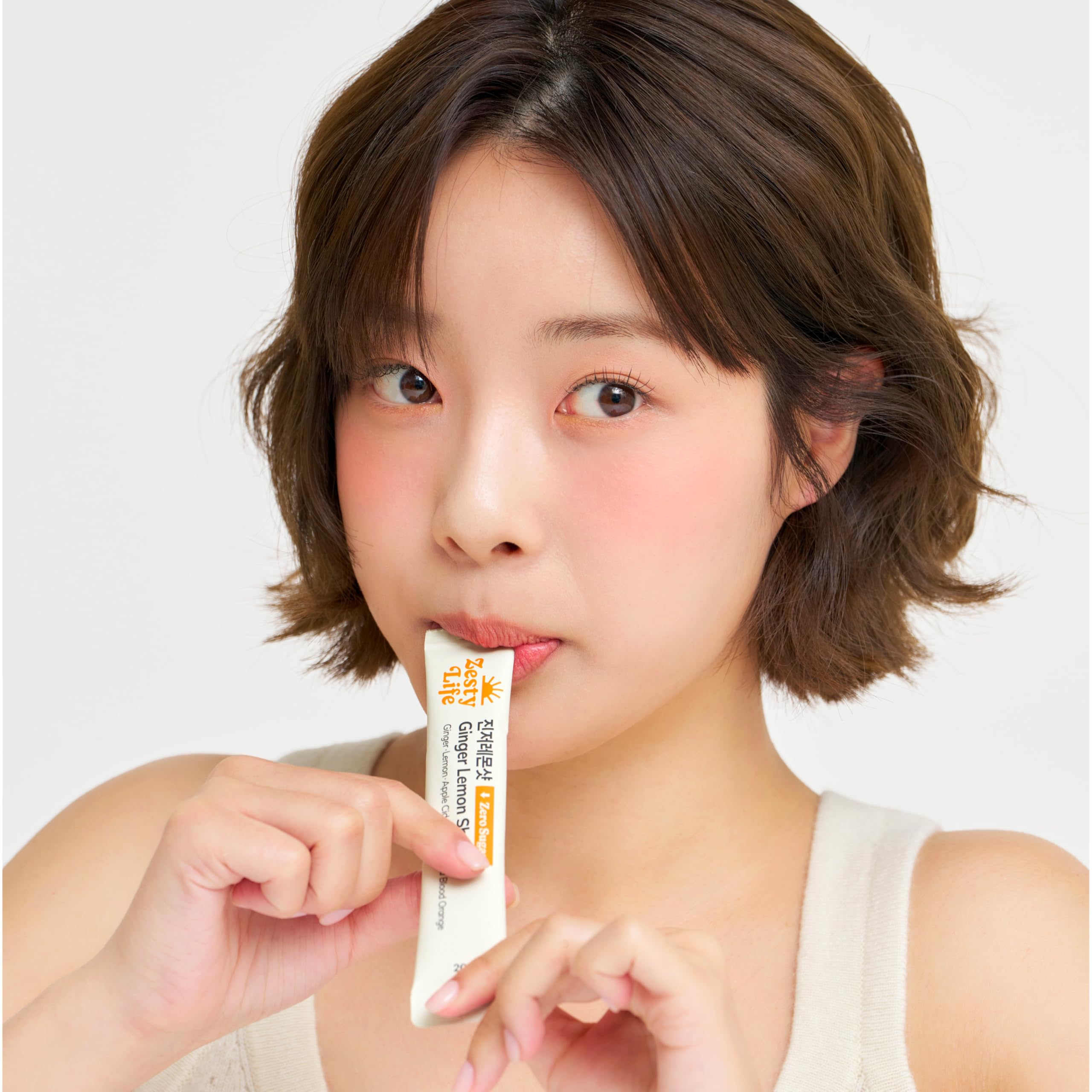Glow Shine travel-ready packaging keeps 14 shots accessible while on the move.