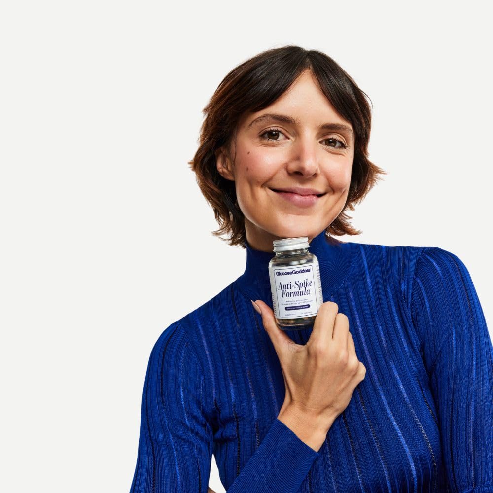 Glucose Revolution Anti-Spike Formula bottle beside a balanced meal plan.