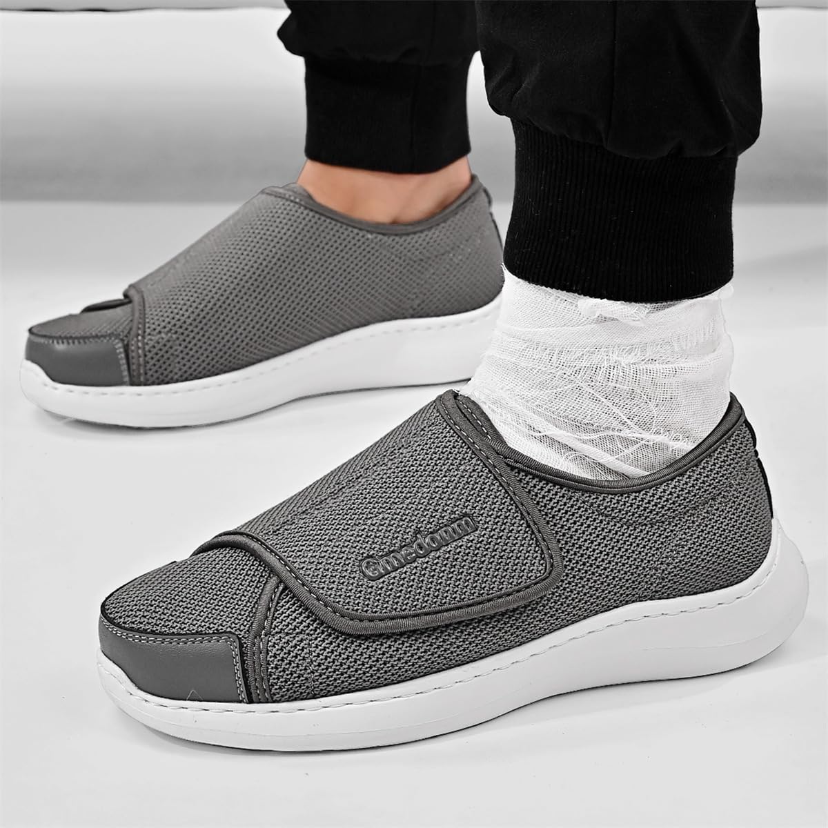 Gmedonm men's wide width shoes with breathable knitted upper for cool, dry feet.