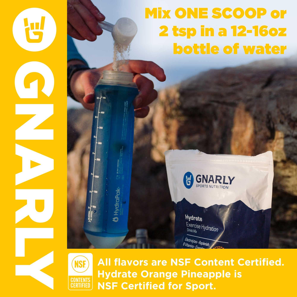 Measuring scoop beside Gnarly Hydrate Lemonade powder for easy dosing.