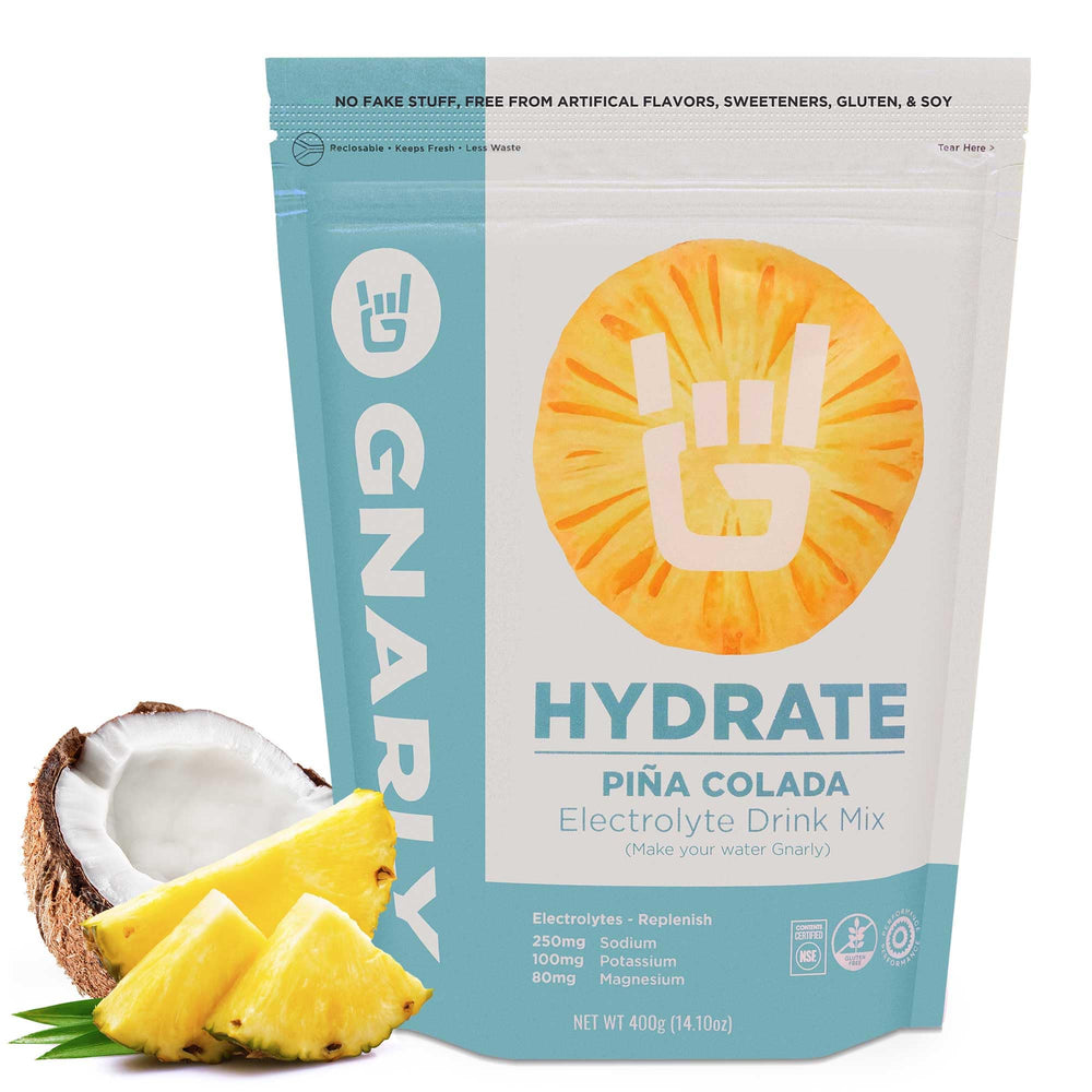 Gnarly Hydrate Pina Colada bottle being poured for refreshing hydration.