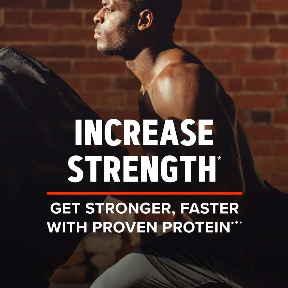 GNC AMP Wheybolic Alpha Vanilla powder jar close-up highlighting fast-digesting protein