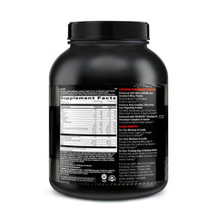 Scoop of GNC AMP Wheybolic coconut caramel for fast post-workout protein delivery