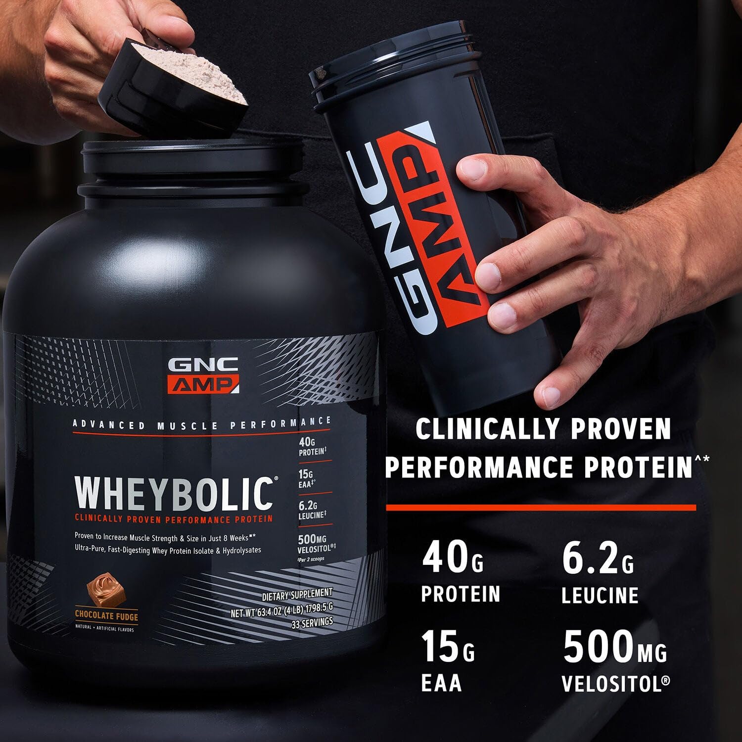 GNC AMP Wheybolic glass with fruits suggesting post-workout use.