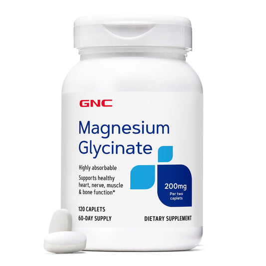 GNC Magnesium Glycinate caplets close-up; supports muscle and bone function for daily wellness