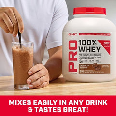GNC Pro Performance 100% Whey Protein Powder 2.0 in gym bag ready for training days