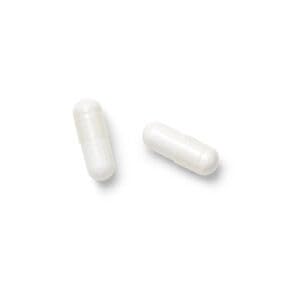 GNC Pro Performance L-Glutamine label close-up showing gluten-free, unflavored formula.