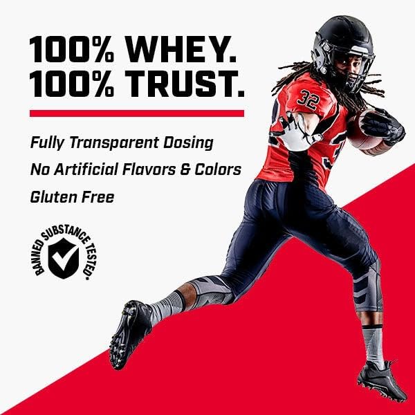 Powder being dispensed from GNC Pro Performance Whey container